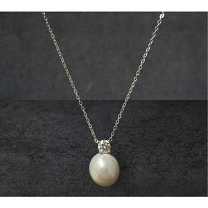 Pearl Necklace with Adjustable Length w/ Moissanite Solitaire Diamond